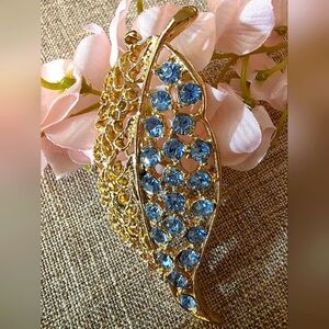Goldtone and Blue Crystal Leaf Brooch